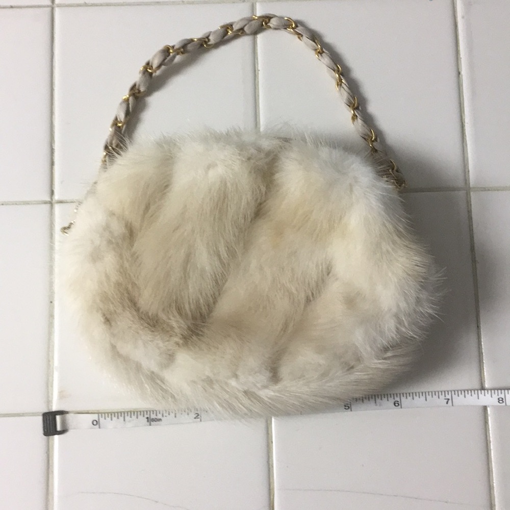 Authentic mink wristlet. In new condition.